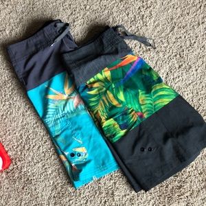 2 pairs of board shorts- ocean curent size 32.
